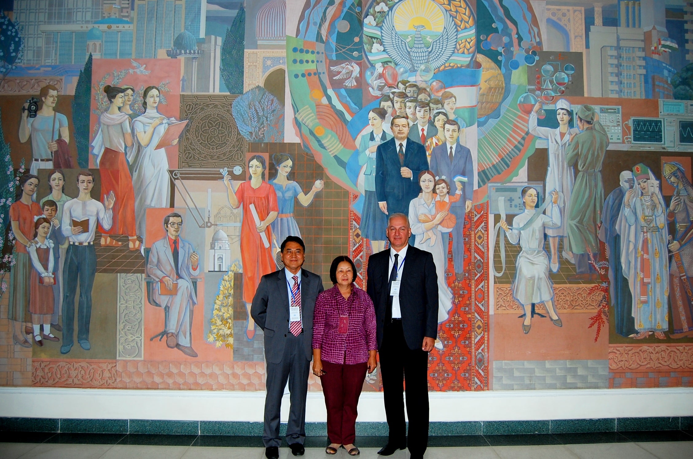 Members of the academic council on the background of a wall painting in Samarkand State University. Scientific Conference. Samarkand, September, 2017