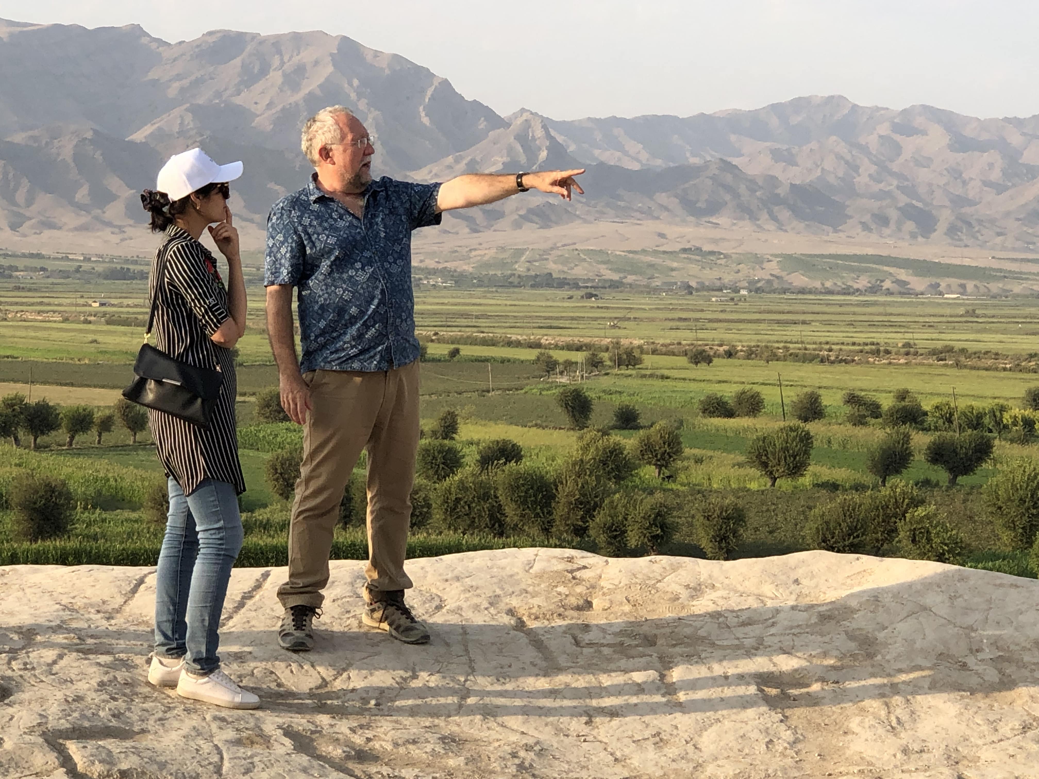 Professor Tim Williams showing direction. Silk Roads: Fergana-Syrdarya Corridor UNESCO workshop. Khujand, Tajikistan. 2019